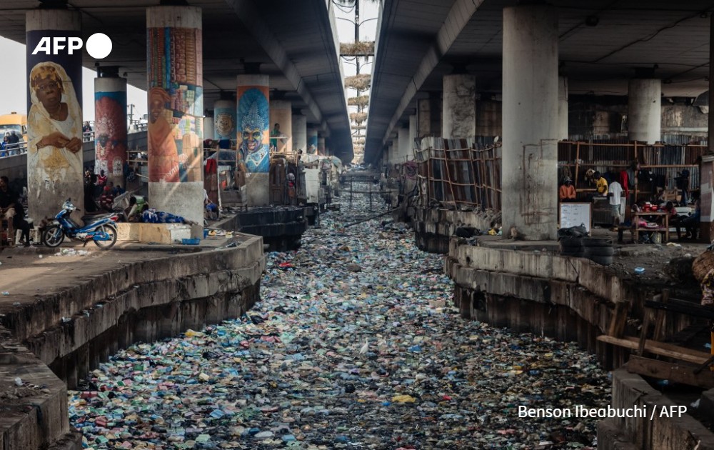 AFP picture by Benson Ibeabuchi - Clogged up canal in Lagos, Nigeria - 2024 