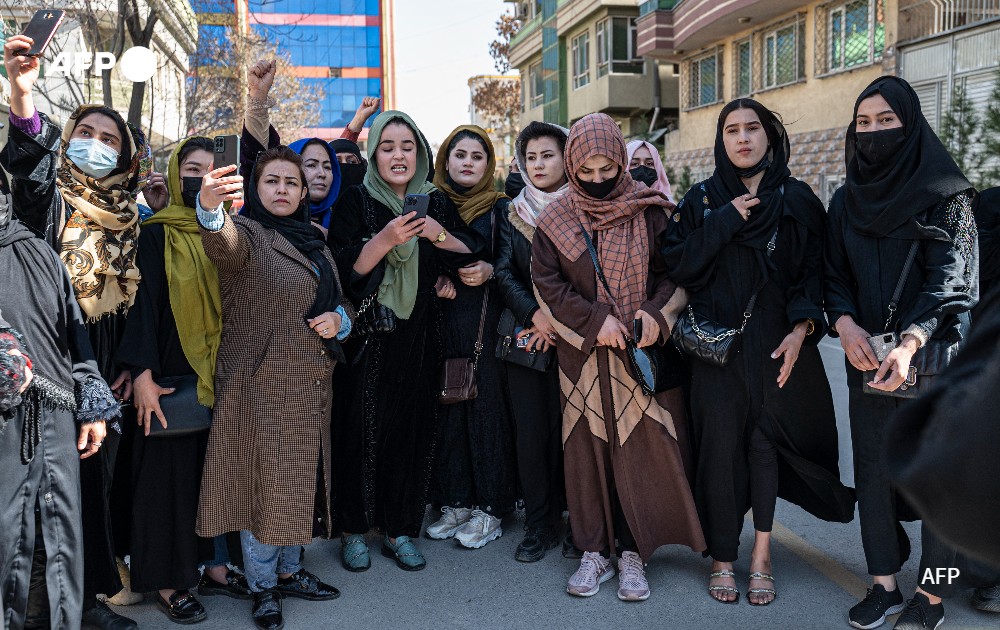 Afghan women protest for their rights during International Women's Day, in Kabul, Afghanistan.