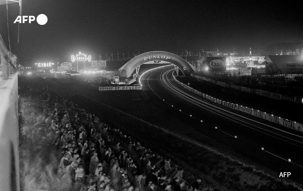 Picture taken at night of the Dunlop footbridge on the Le Mans circuit, 1963