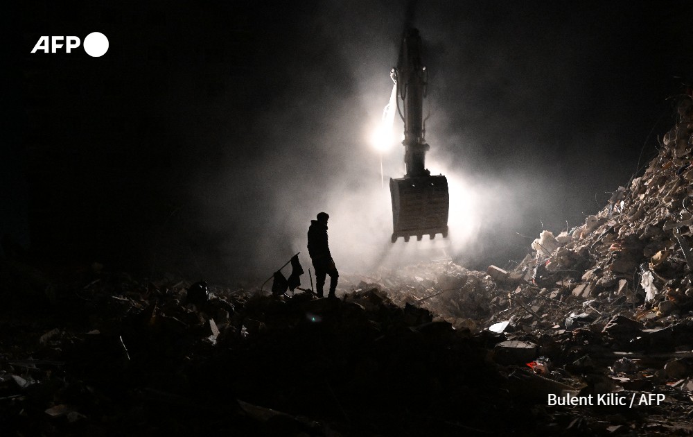 Turkish resident near collapsed buildings in Hatay, after earthquake in Turkey