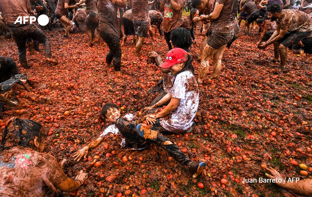 Children participate in the tenth annual Tomato Fight Festival