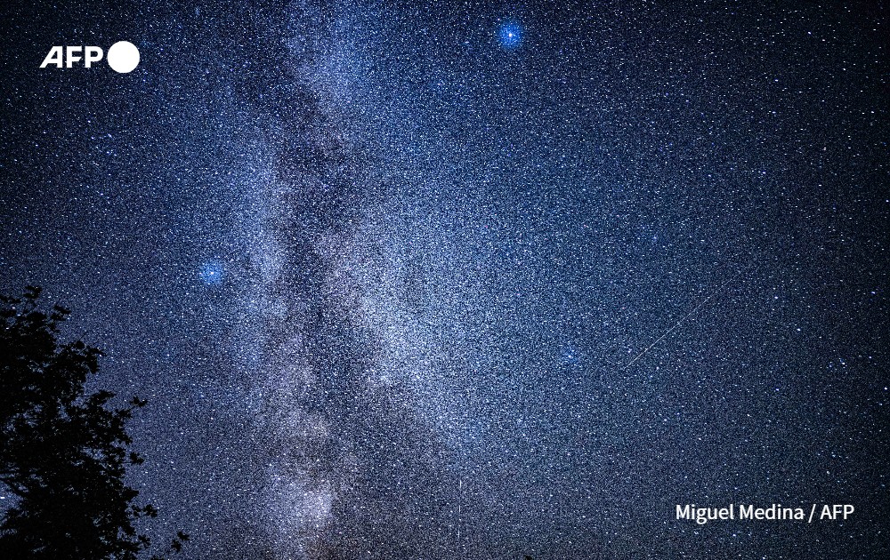 Picture shows shooting stars streaking across the Milky Way