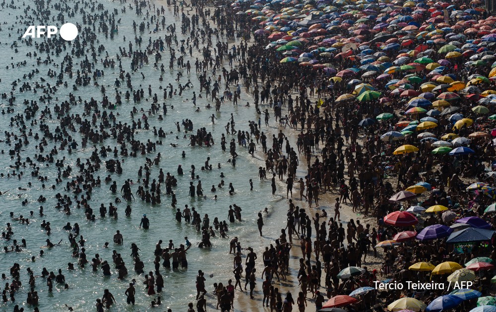 Sunbathers enjoy beach