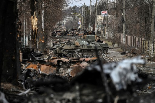 Destroyed Russian armored vehicles line the street in the city of Bucha, west of Kyiv, on March 4, 2022.