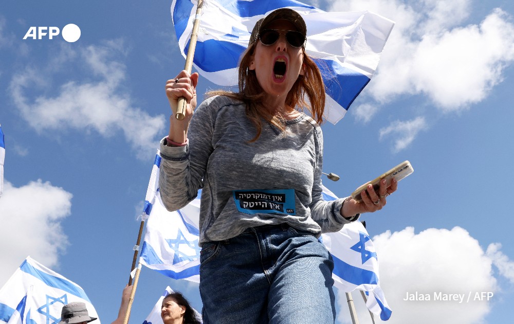 Woman protests against the government's controversial judicial reform bill, Israel.