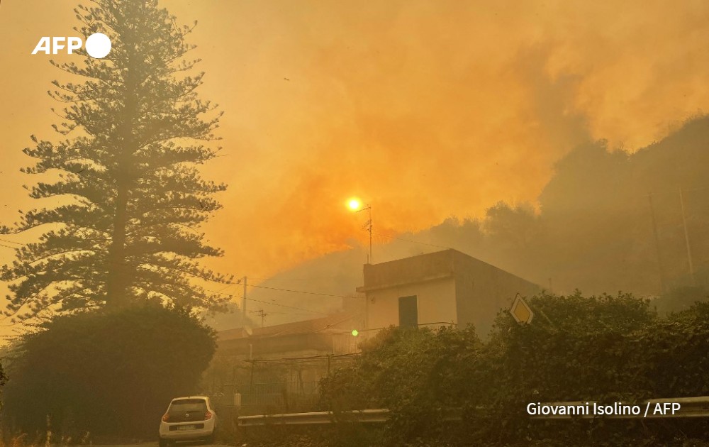 AFP picture by Giovanni Isolino - Fire in Messine, Italy